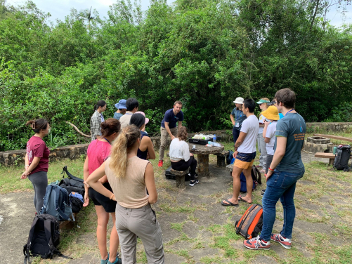 Participants attentively learn the techniques of eDNA sampling.